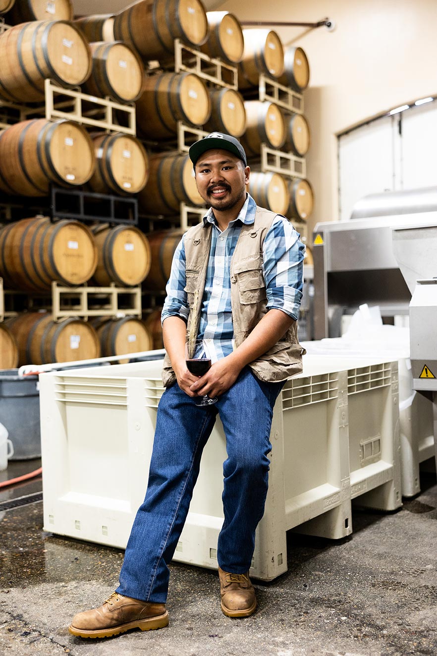 Cuong is at home in the Barrel Room, where he makes all the wine.