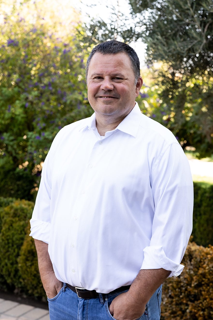 Casual portrait shot of Mark Jr on the winery grounds.