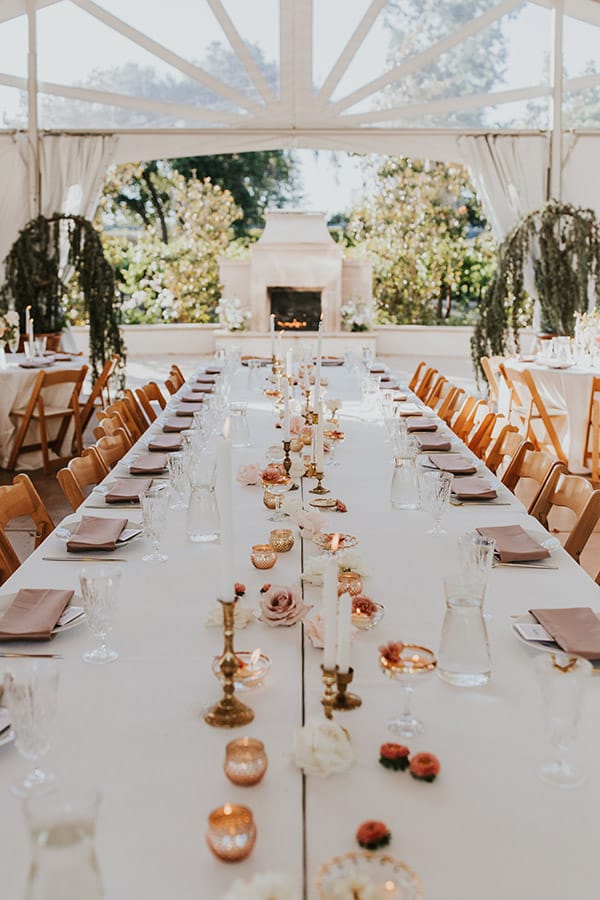 Beautiful tables and tent set up for Sacramento wedding reception.